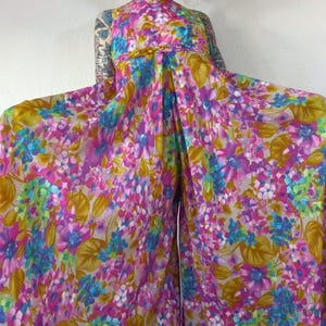 Vintage late 1960’s pastel rainbow watercolor floral jumpsuit with sweeping extra wide pant legs & pearl trimmed empire waist, palazzo image 2