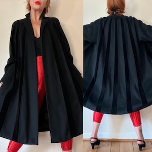 Vintage 1950’s black wool swing coat with velvet paneling, open front, raglan sleeves, welt pockets & a sweep of dreams, Lilli Ann