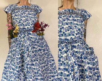 Vintage 1950’s cotton blueberry novelty print wrap dress with large patch pockets, cap sleeves & lattice knotting details by Swirl