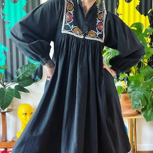 Vintage 1970’s cotton midi dress with side pockets, balloon sleeves, & the most magical hand embroidery throughout by Morego