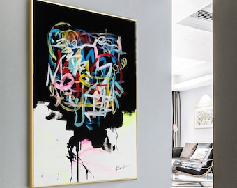 May include: Abstract art painting with colorful lines and shapes on a black background. The painting is framed in gold and has a white signature in the bottom right corner.