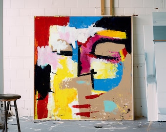 May include: Abstract painting with bold strokes of red, yellow, blue, black, white, and pink. The painting features a stylized face with closed eyes and a geometric design.