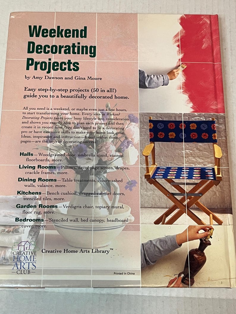 May include: Book cover for "Weekend Decorating Projects" by Amy Dawson and Gina Moore. The cover features a hand painting a wall red, a wooden chair with a floral patterned cushion, and a vase with a flower.