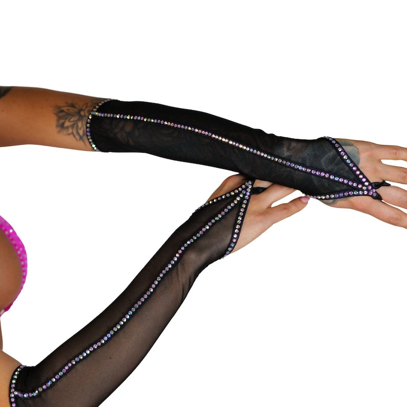 May include: A pair of black mesh fingerless gloves with iridescent rhinestones along the seams.