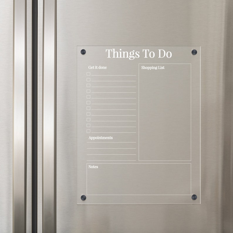 May include: A clear acrylic dry erase board with the text "Things To Do" at the top. The board is divided into sections for "Get It Done", "Shopping List", "Appointments", and "Notes".