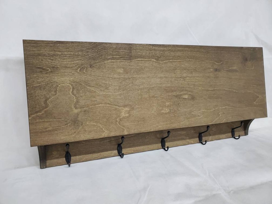 5 Hook Coat Rack With Hidden Gun Concealment Storage in Dark