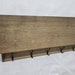 see more listings in the coat rack with storage section