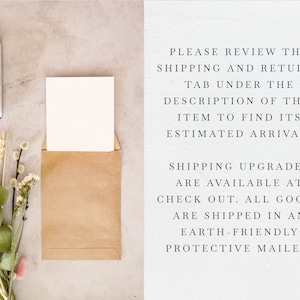 May include: A brown paper envelope with a white card inside. The envelope is sitting on a table with a vintage camera and flowers. The text on the right side of the image reads: "PLEASE REVIEW THE SHIPPING AND RETURNS TAB UNDER THE DESCRIPTION OF THIS ITEM TO FIND ITS ESTIMATED ARRIVAL. SHIPPING UPGRADES ARE AVAILABLE AT CHECK OUT. ALL GOODS ARE SHIPPED IN AN EARTH-FRIENDLY PROTECTIVE MAILER."