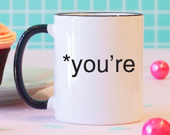 Taza de cerámica con borde negro "Eres gracioso"