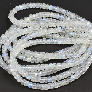 AAA White Rainbow Moonstone Rondelle Beads with Blue Flash (8 Inch Strand)