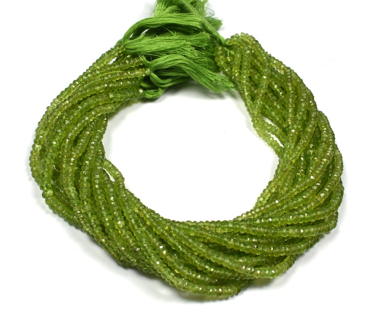 Natural Peridot Rondelles~~ AAA Quality~~ 2 Strand~~Natural Peridot Micro Faceted Centre Drill Rondelles 4.5mm-5mm~~13 Inch