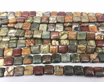 May include: A strand of square-shaped gemstone beads with a variety of brown, red, and gray colors. The beads have a polished finish and are made of natural stone.