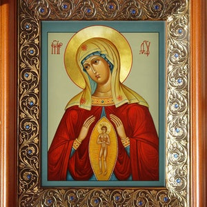May include: A religious icon depicting the Virgin Mary holding a small figure of Jesus Christ in her arms. The icon is painted in a traditional style with gold accents and a blue background.