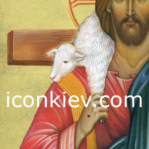May include: A religious icon depicting Jesus Christ carrying a white lamb on his shoulder. The icon is painted in a traditional style with gold accents and the text "iconkiev.com" at the bottom.