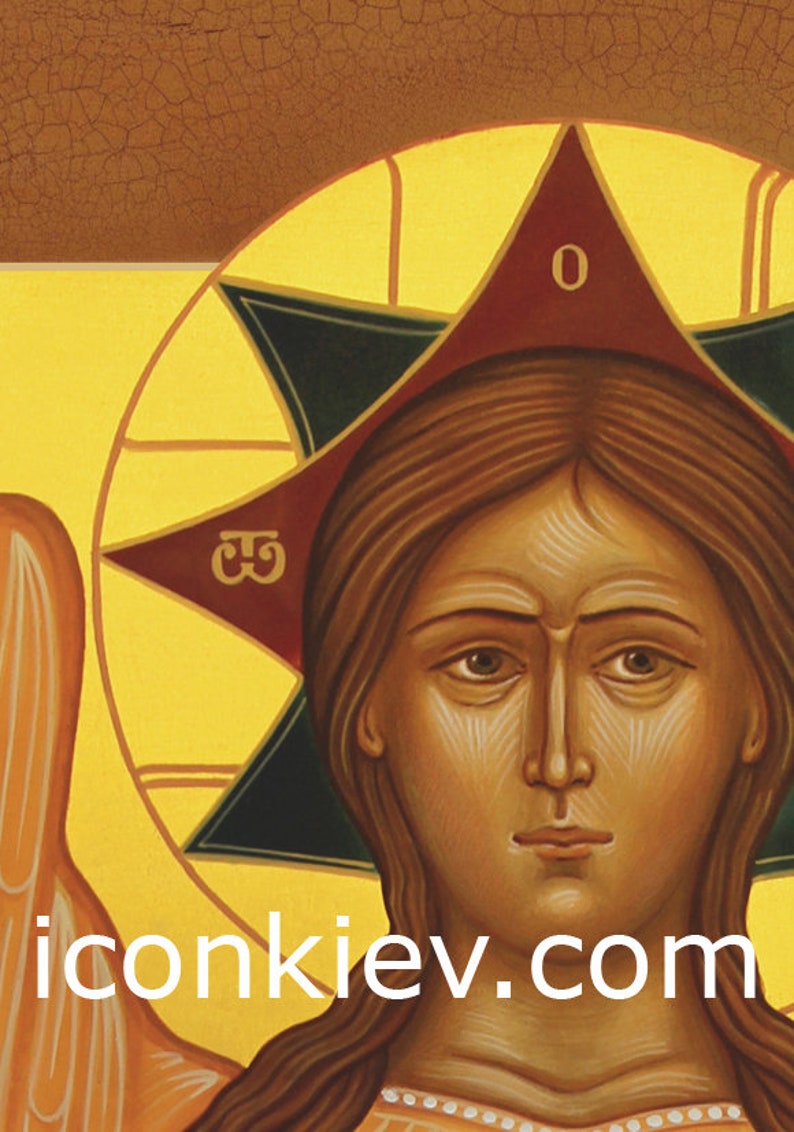 May include: A religious icon painting depicting a woman with brown hair and a gold halo. She is wearing a white robe and has a serious expression. The icon is painted in a traditional style with a gold background and a red and green star.