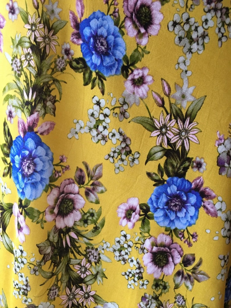 Blue and Purple with Yellow Background Floral Viscose Fabric