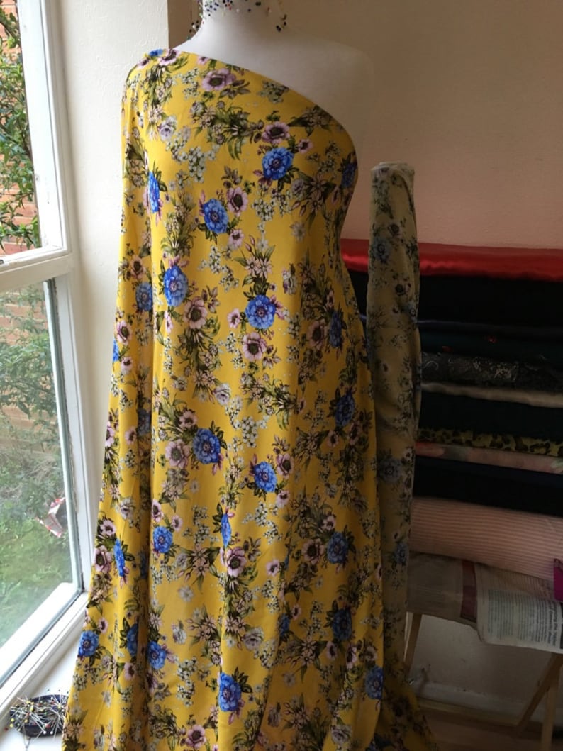 Blue and Purple with Yellow Background Floral Viscose Fabric