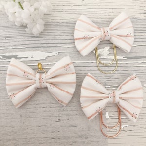 Pink striped fabric bow clip