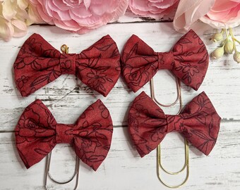 Dark red floral fabric bows