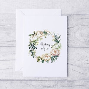 Carte « Je pense à vous » avec une couronne de pivoines