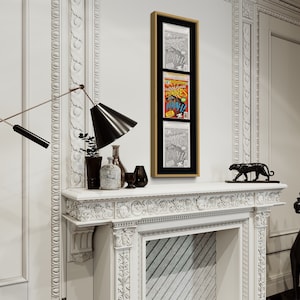 May include: A white fireplace mantel with ornate detailing, a black lamp with a cone-shaped shade, and a framed print of a comic book cover. The print is in a gold frame and has three panels. The top panel shows a black and white image of a superhero, the middle panel shows a colorful image of a superhero, and the bottom panel shows a black and white image of a superhero. There is a black panther statue on the mantel and a black panther statue on the floor.