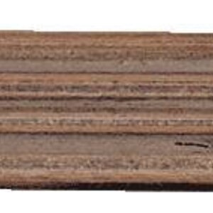 May include: Close-up of a section of a wooden picture frame. The frame has a layered design with a dark brown color and a textured surface. The frame's edge has a decorative, ornate design.
