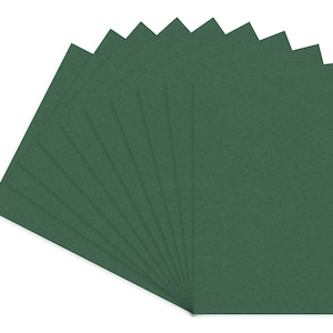 May include: A pack of ten 12x12 inch sheets of dark green cardstock paper.