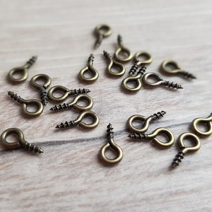Schroefoogjes 20 stuks bronskleurige draaioogjes 8 x 4 mm voor glazen flessen