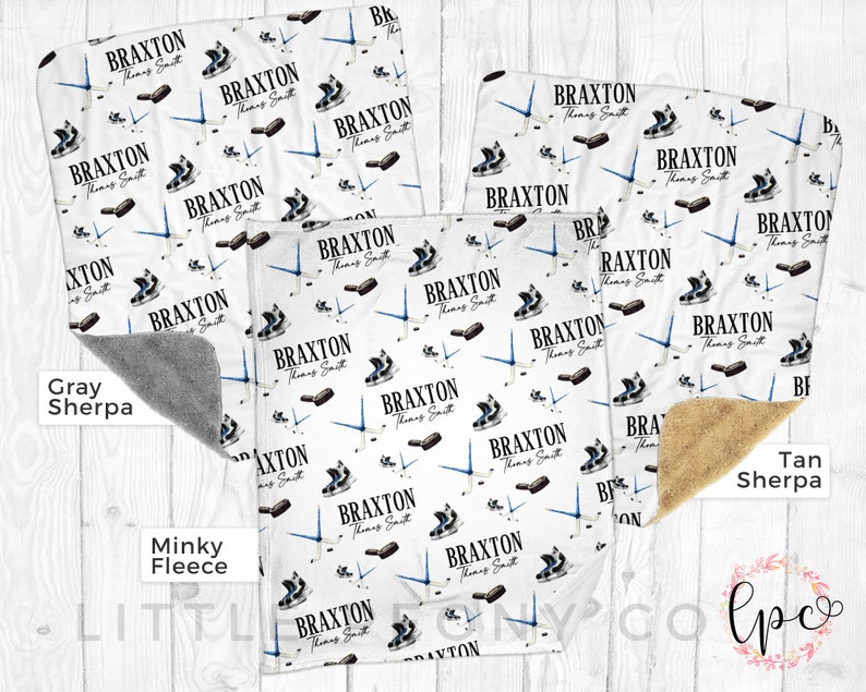 May include: A white baby blanket with a hockey theme. The blanket features a repeating pattern of hockey skates and sticks with the name "Braxton" and the text "Thomas Smith". The blanket is available in three different fabric options: gray sherpa, minky fleece, and tan sherpa.