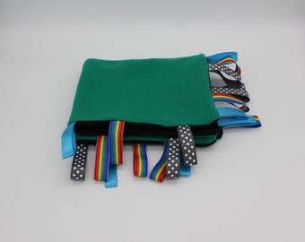 Manta sensorial / de confort negra y verde