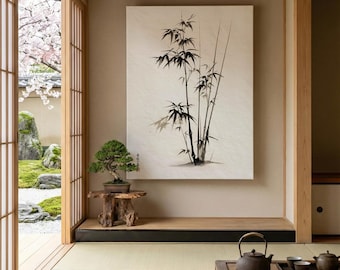 May include: A serene interior scene featuring a bamboo painting, a bonsai tree, and traditional Japanese tea set. The artwork depicts black bamboo stalks and leaves against a cream background. The room has a minimalist aesthetic with natural light.