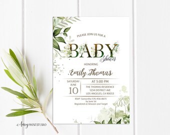 May include: White baby shower invitation with green floral accents. The invitation reads "Please join us for a Baby Shower" honoring Emily Thomas. Details include the date, time, and location. A sprig of greenery is in the foreground.