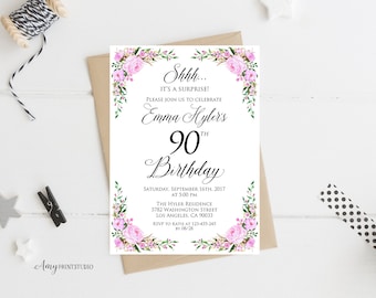 May include: A white rectangular birthday invitation card featuring pink floral corner accents and black text that reads: Shhh... IT'S A SURPRISE! PLEASE JOIN US TO CELEBRATE Emma Hyler's 90th Birthday SATURDAY, SEPTEMBER 16TH, 2017 AT 5:00 PM THE HYLER RESIDENCE.