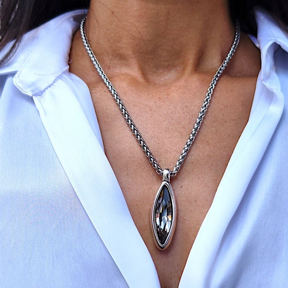 Swarovski three stone necklace deals