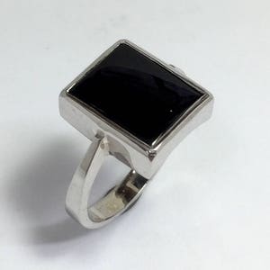 Sterling silver vintage hand crafted ladies black onyx ring.