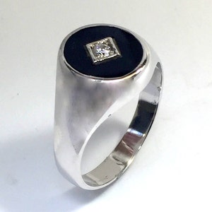 Sterling silver black onyx and diamond or cz quality vintage mens ring.