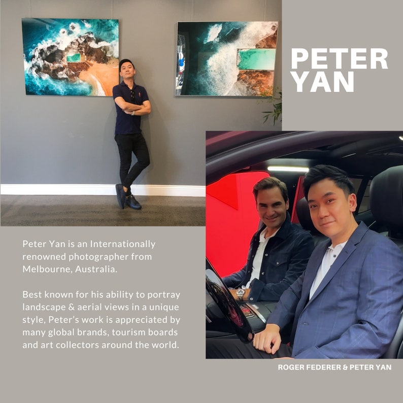 May include: A portrait of Peter Yan, an internationally renowned photographer from Melbourne, Australia. He is standing in front of two framed photographs of aerial landscape views. The text "PETER YAN" is displayed in large white letters on a grey background. Below the portrait, a caption reads "Peter Yan is an internationally renowned photographer from Melbourne, Australia. Best known for his ability to portray landscape & aerial views in a unique style, Peter's work is appreciated by many global brands, tourism boards and art collectors around the world."