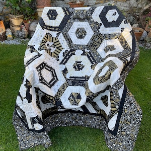 Striking black/white quilt.