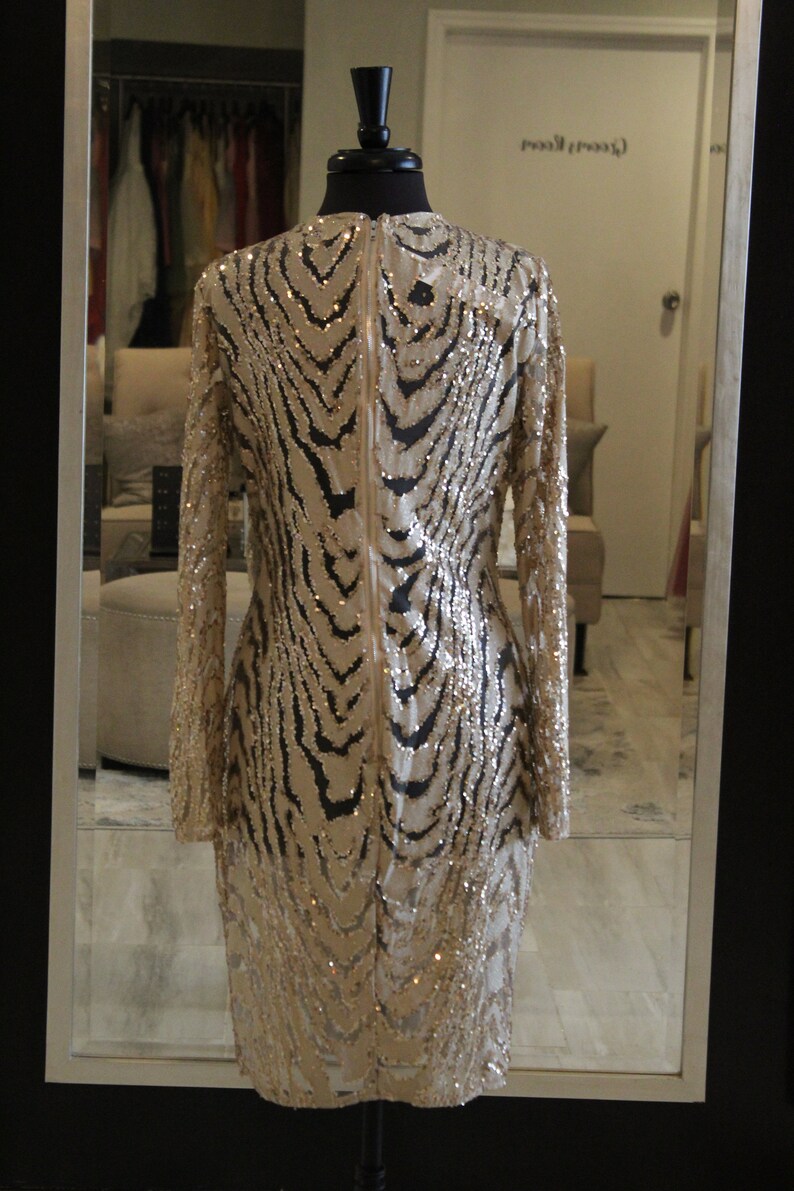 Love /& Lemonade Size Large Long Sleeve Gold Sparkly Thy Length Dress with Subtle Animal Print