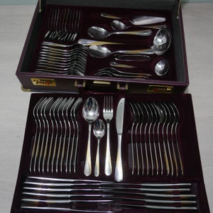Nivella Solingen - coffret à couverts 12 personnes 72 pièces - en partie plaqué or 23/24 carats - Allemagne années 1980 - vintage