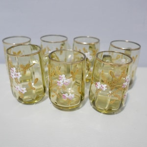 Set of 7 antique olive green drink glasses painted with floral motif - around 1900