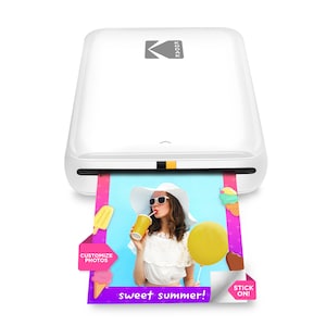 May include: A white Kodak Mini printer with a photo printing out that says "sweet summer!" and has a woman in a white hat and sunglasses drinking a beverage. The photo has a pink, blue, and yellow background with ice cream and popsicle graphics. The photo has a sticker on the bottom right corner that says "stick on!" and a sticker on the bottom left corner that says "customize photos".