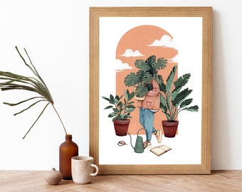 Könnte beinhalten: Gerahmter Kunstdruck mit einer Person, die eine große Pflanze vor einem pfirsichfarbenen Bogen mit Wolken hält. Topfpflanzen und eine Gießkanne sind im Vordergrund. Der Druck ist in einem hellen Holzrahmen.