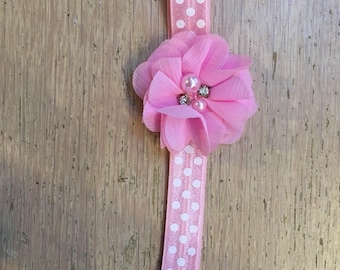 Baby headband pink with white dots with flower in pink