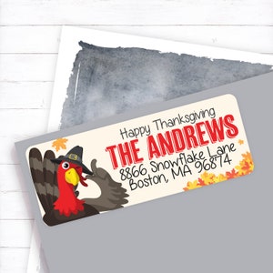 May include: A Thanksgiving-themed return address label with a cartoon turkey wearing a pilgrim hat and winking. The label says "Happy Thanksgiving THE ANDREWS 8866 Snowflake Lane Boston, MA 96874".