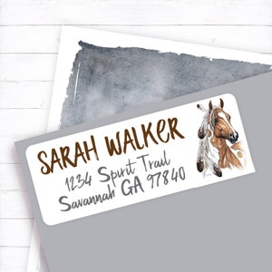 May include: White return address label with brown text and a watercolor image of a brown and white horse with feathers. The text reads "SARAH WALKER 1234 Spirit Trail Savannah GA 97840".