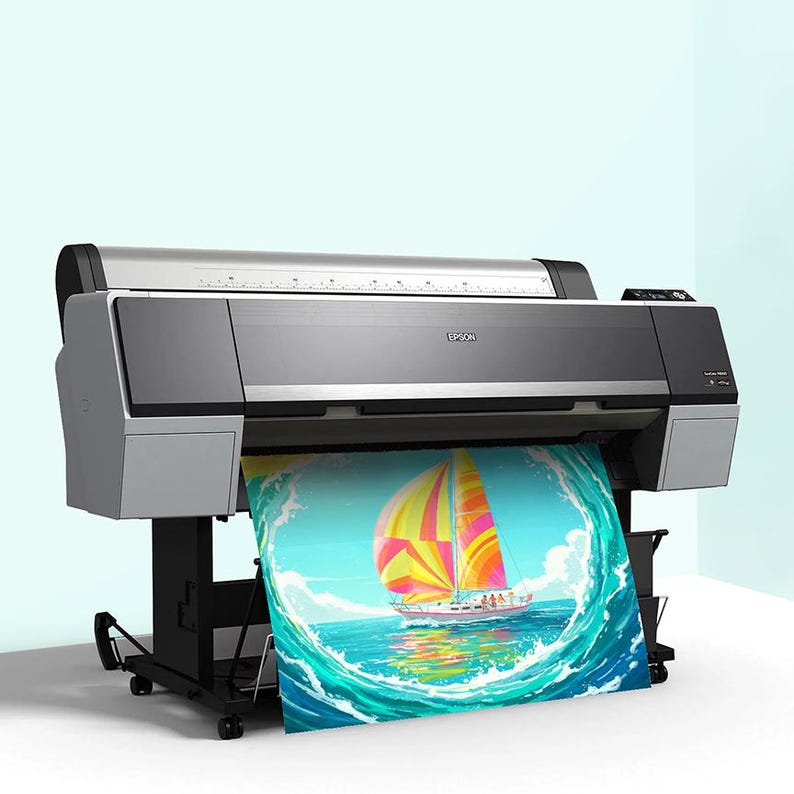 May include: A large-format Epson printer in silver and black, printing a colorful image of a sailboat on the ocean. The print is emerging from the printer, showcasing vibrant blues, yellows, and pinks. The printer is on a black stand with wheels.