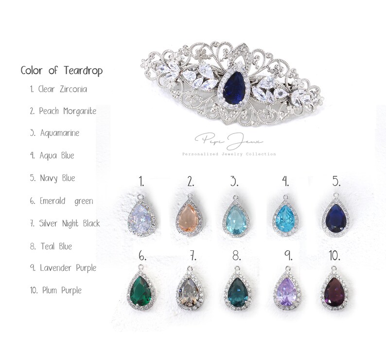 Puede incluir: Diez dijes de cristal en forma de l&aacute;grima de diferentes colores, incluyendo transparente, melocot&oacute;n, aguamarina, azul, verde esmeralda, plata, azul verdoso, lavanda y ciruela. Los dijes est&aacute;n dispuestos en dos filas de cinco, con los n&uacute;meros del 1 al 10 debajo de cada dije. El texto "Color of Teardrop" est&aacute; en la parte superior de la imagen, seguido de una lista de los colores y sus n&uacute;meros correspondientes.