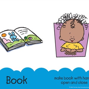 May include: A colorful book with a blue bunny on the cover is open. A person with brown skin is making the sign for "book" by holding their hands together like a book and opening and closing them. The text below the image reads "make book with hands, open and close".