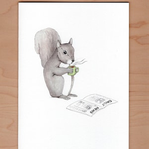 May include: A gray squirrel sits on a white background, holding a green mug and reading a newspaper that says "DAILY NEWS".